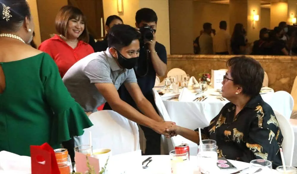 LOOK: Sandro Marcos shakes hands with Rowena Guanzon